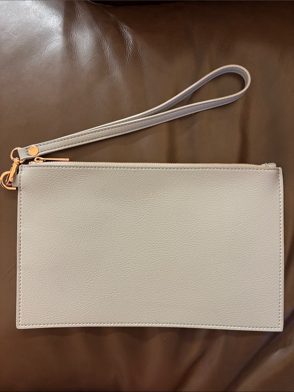 Ted Baker Light Gray Wristlet Clutch with Rose Gold Accents